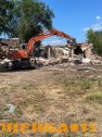 Услуги полноповоротного колесного экскаватора фото1